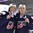 PLYMOUTH, MICHIGAN - APRIL 6: Team U.S.A.'s Amanda Pelkey #37 and Emily Pfalzer #8 bite their gold medals following a 3-2 overtime win against team Canada during the gold medal game at the 2017 IIHF Ice Hockey Women's World Championship. (Photo by Minas Panagiotakis/HHOF-IIHF Images)